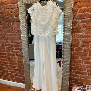 White jumpsuit with white lace overlay